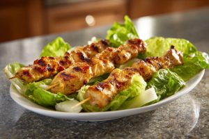 Grilled Chicken Skewers with Tangy Dipping Sauce and Crisp Lettuce