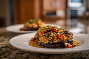 Herb-Kissed Stuffed Eggplant with Savory Rice & Garlic Tahini