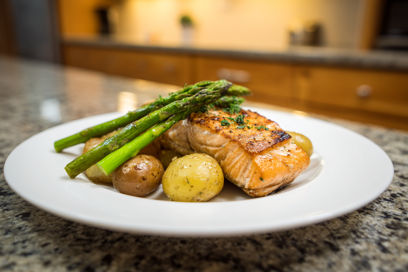 One-Pan Lemon Herb Salmon with Crispy Potatoes & Cheesy Asparagus