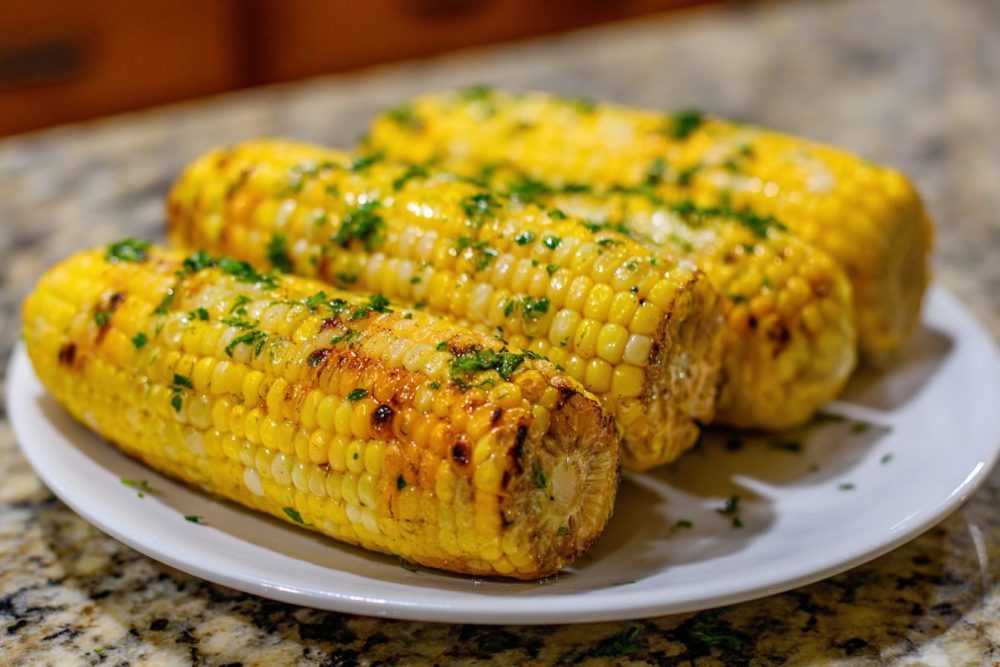 Summer's Best Bite: Juicy Grilled Corn with Herby Butter
