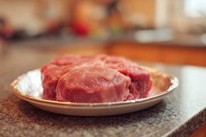 Effortless Foiled Meat Slicing Technique
